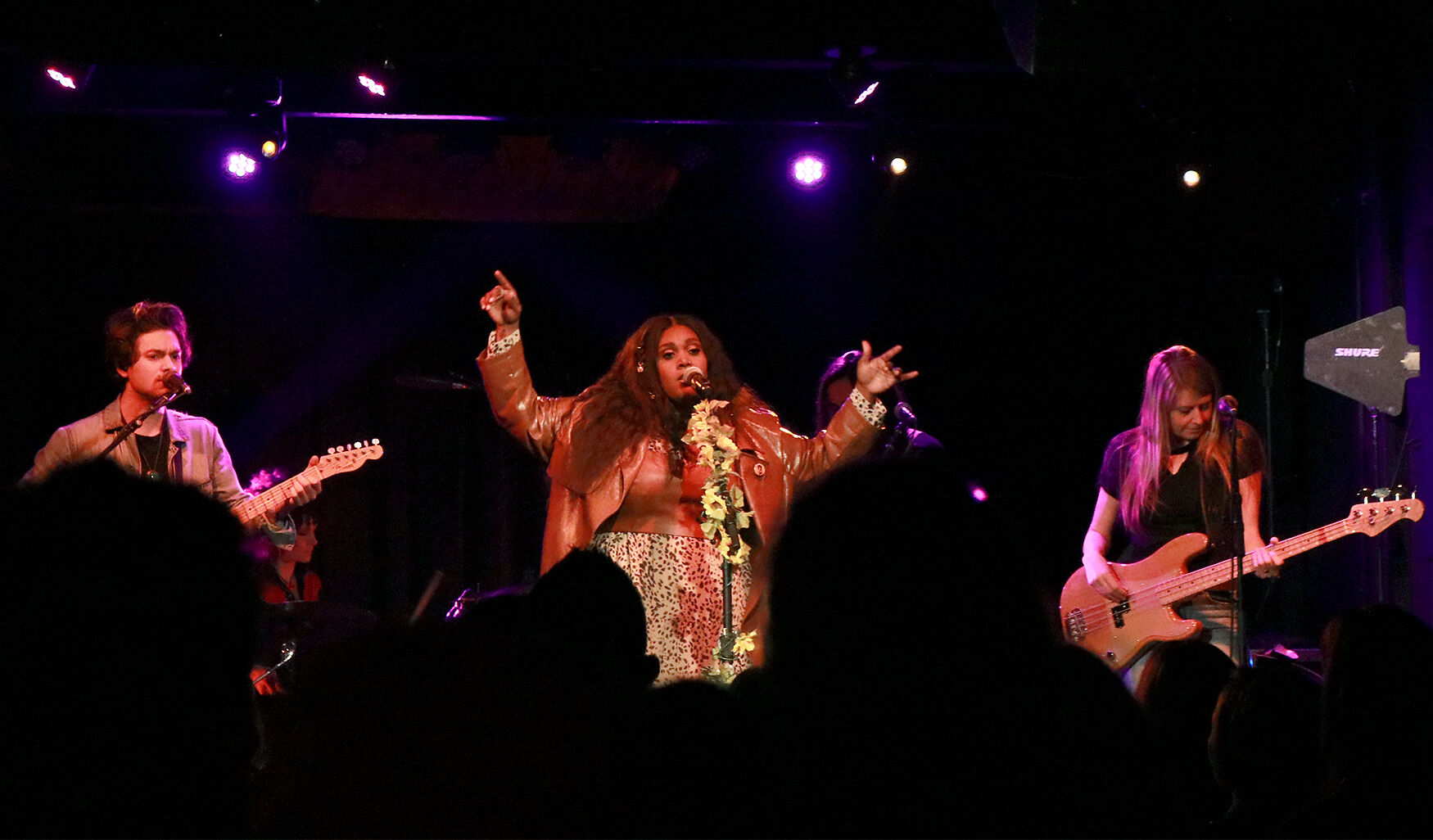 From left, Gabe Burdulis, Brittney Spencer, and Kirby Barber perform